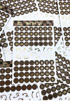 Sticker sheets with numbers and decorative elements on a white background