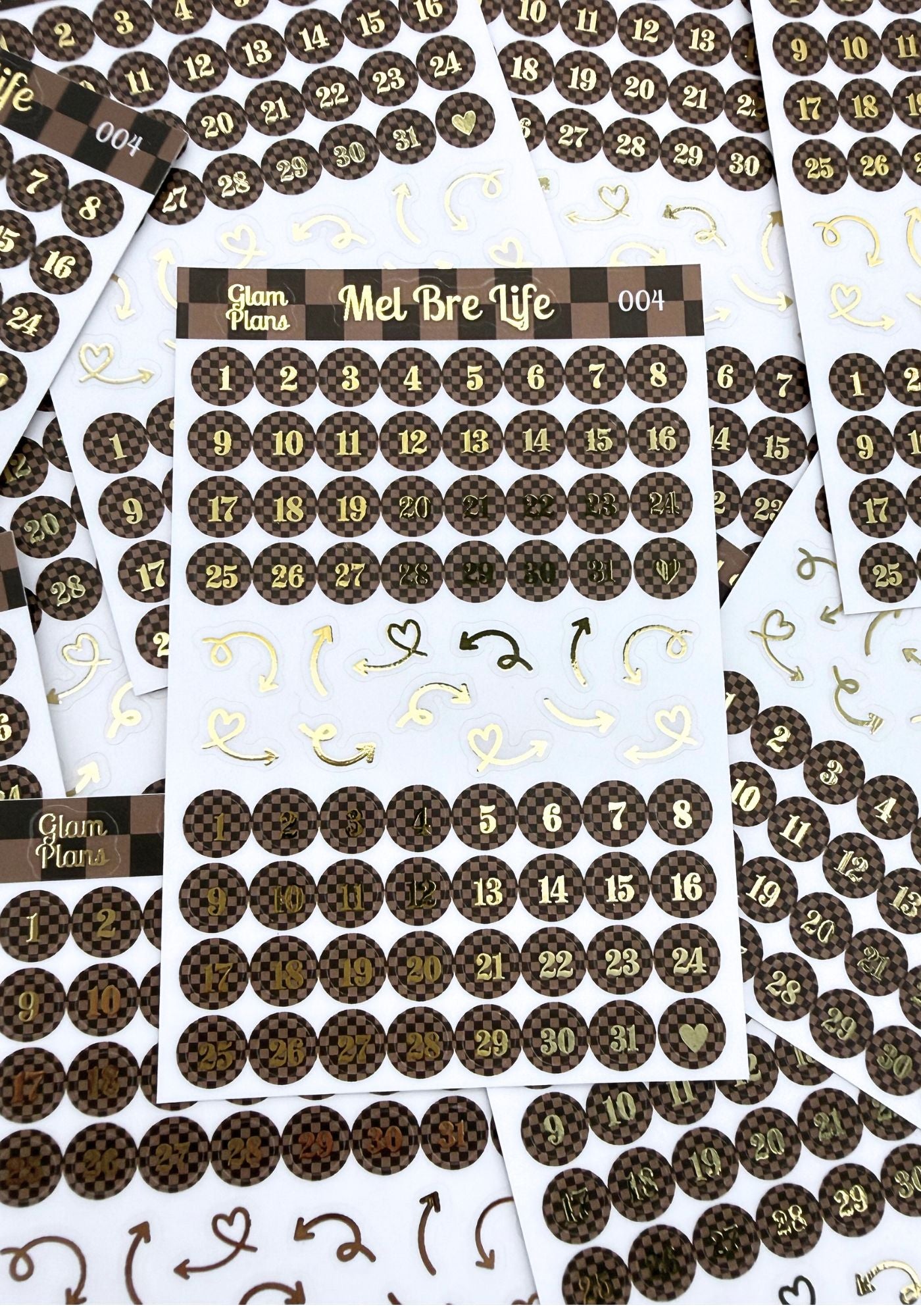 Sticker sheets with numbers and decorative elements on a white background