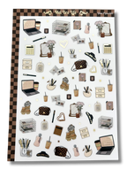 Clear matte glam planner sticker sheet with gold foil accents featuring laptops, planners, affirmations, and cozy productivity details