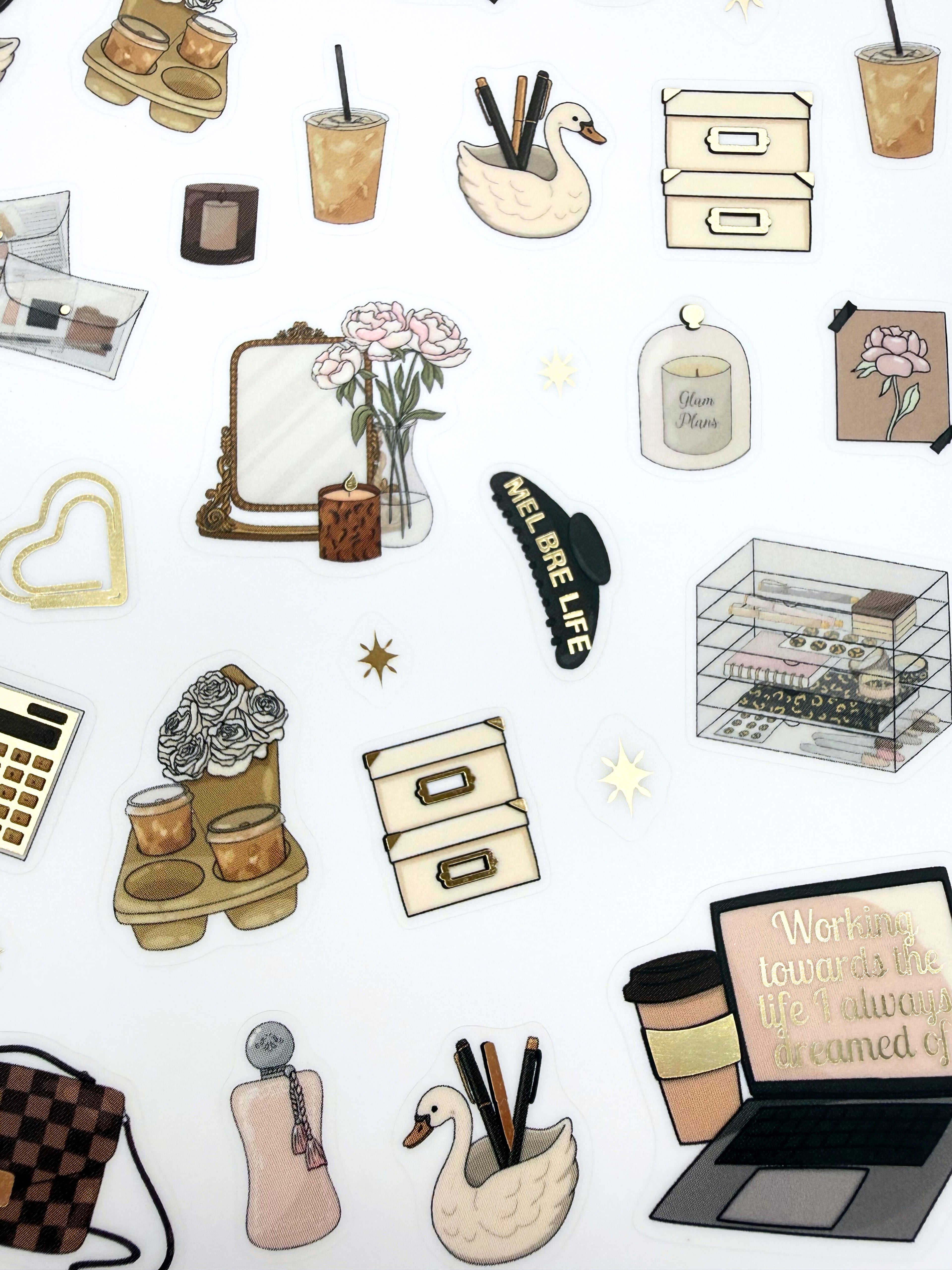 Clear matte glam planner sticker sheet with gold foil accents featuring laptops, planners, affirmations, and cozy productivity details