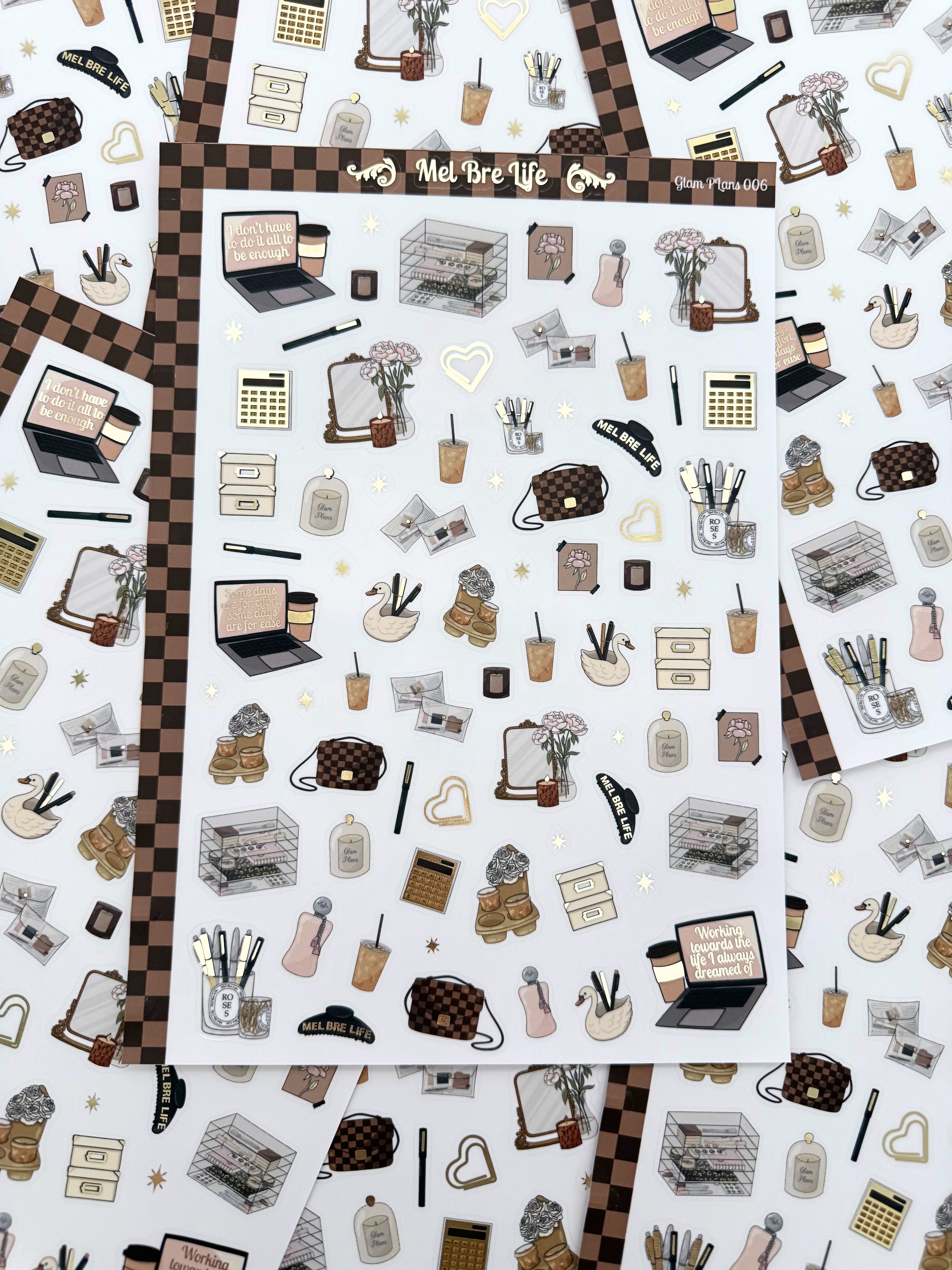 Clear matte glam planner sticker sheet with gold foil accents featuring laptops, planners, affirmations, and cozy productivity details