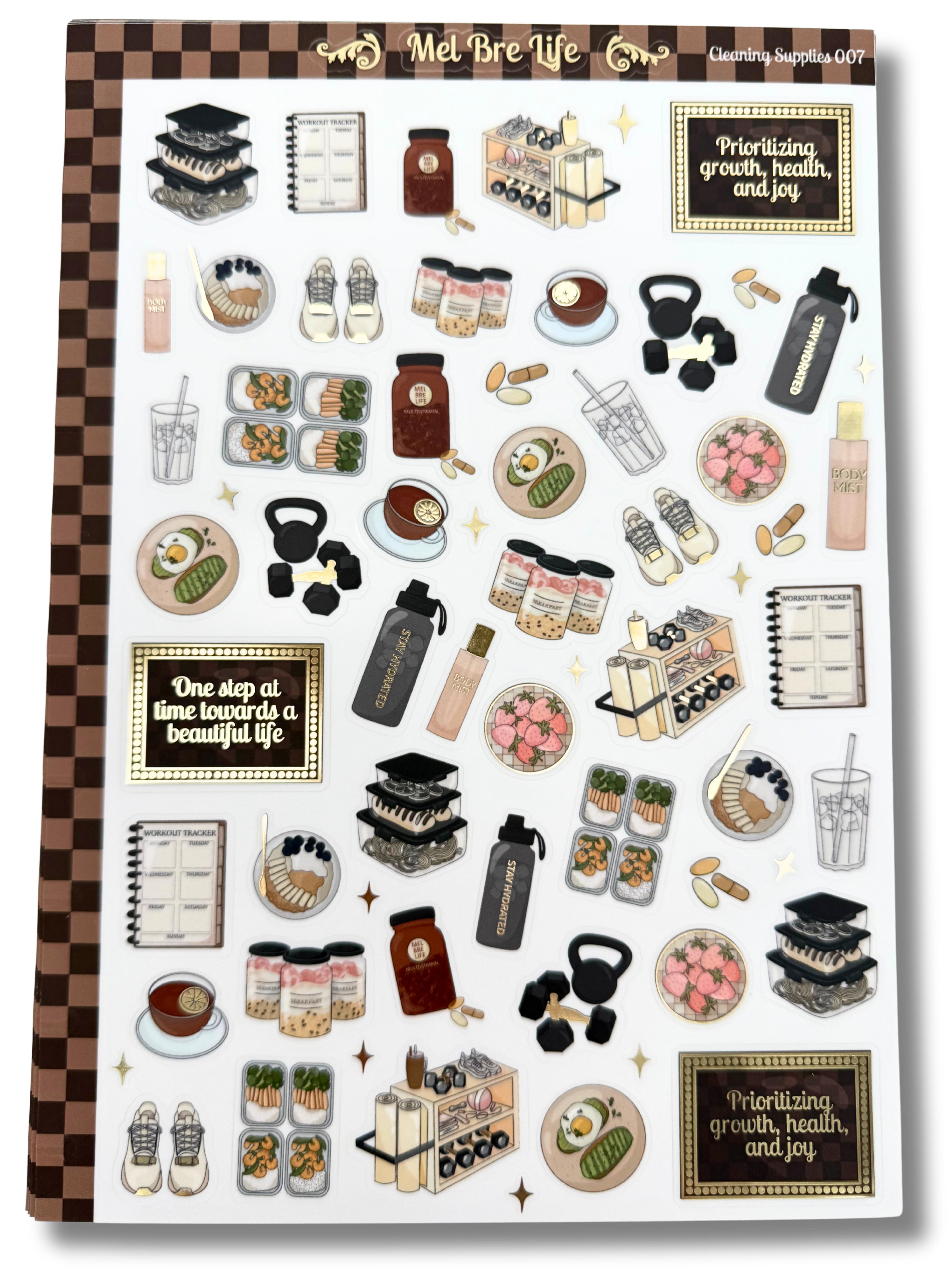Clear matte glam planner sticker sheet with gold foil accents featuring wellness icons, workouts, meals, drinks, and habit tracking details