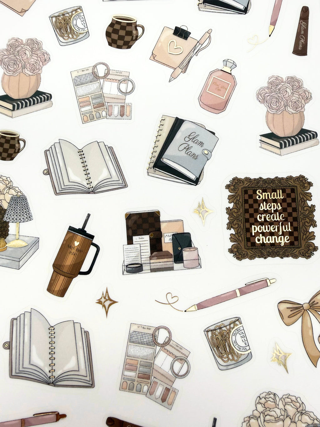Clear matte glam planner sticker sheet with gold foil accents featuring books, mugs, bows, florals, and inspirational quotes