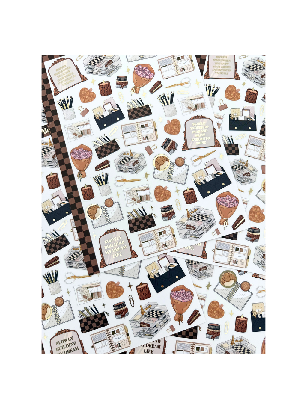 Clear matte glam planner sticker sheet with gold foil accents featuring planners, notebooks, candles, florals, and motivational quotes