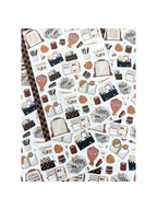 Clear matte glam planner sticker sheet with gold foil accents featuring planners, notebooks, candles, florals, and motivational quotes