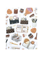 Clear matte glam planner sticker sheet with gold foil accents featuring planners, notebooks, candles, florals, and motivational quotes