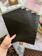 Fairytale Plans planner dividers showing the built-in pockets on the back of each black divider for storing stickers, notes, and planner essentials